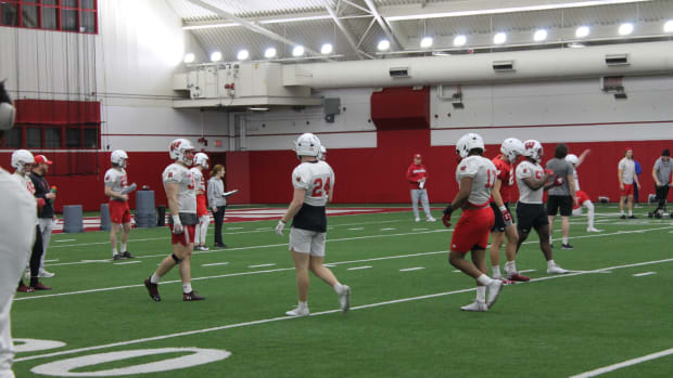 Hunter Wohler and Darryl Peterson walk between drills during practice.